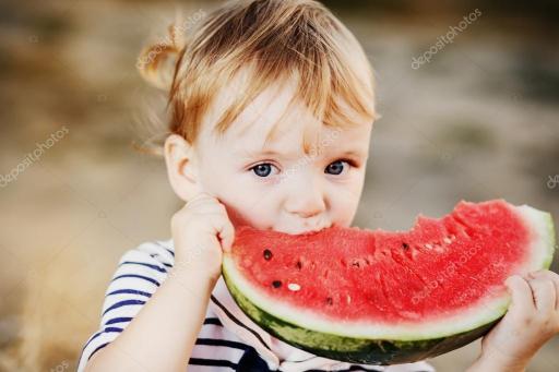 cute girl eating watermelon